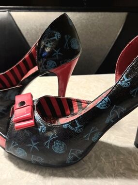 Iron Fist Black and Red Women's High Heel Pumps with Teal Print and Red Bow